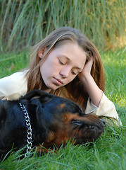 Image showing sleeping dog and woman