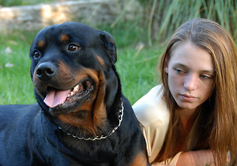 Image showing girl and dangerous dog