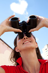 Image showing girl with binoculars and heart cloud