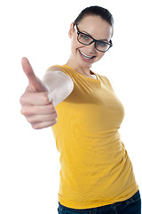 Image showing Pretty teenager showing thumbs-up