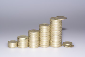 Image showing Rising pyramid of coins