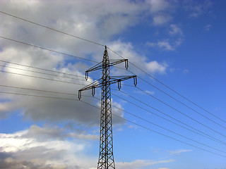 Image showing Power pole and blue sky with clouds