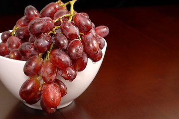 Image showing Grapes in a white bowl on table