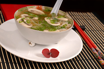 Image showing Asian chicken, glass noodle and rice soup with mushrooms and sca