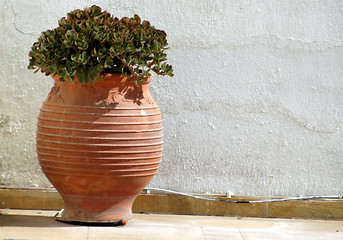 Image showing vase with plant greek island scene