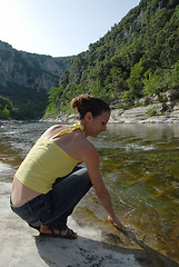 Image showing woman near river