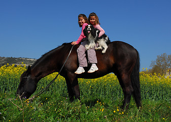 Image showing riding twins 