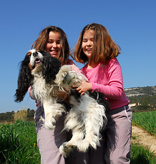Image showing twins and dog