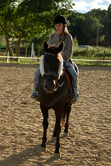 Image showing horse and woman in dressage