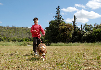 Image showing little girl and her dog