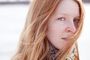 Image showing redhead woman and wind