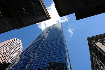 Image showing Looking up at the top of five skyscrapers