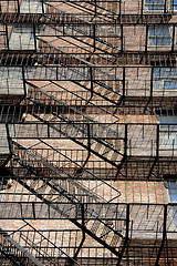 Image showing zig zagging fire escape on back of old apartment building