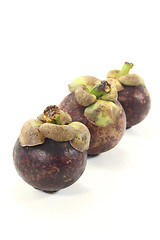 Image showing three Mangosteen