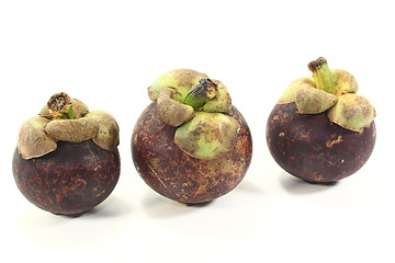 Image showing three fresh Mangosteen