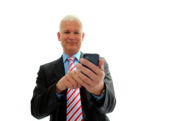 Image showing Businessman with mobile phone isolated