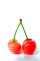 Image showing Red cherry fruits on a white background