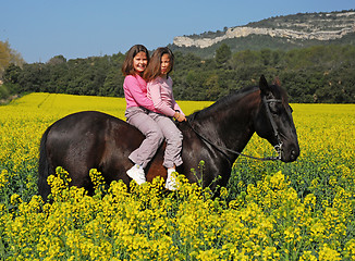 Image showing riding twins 