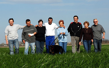 Image showing people and dogs