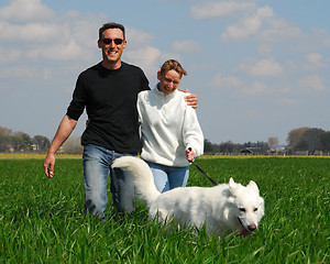 Image showing couple and dog