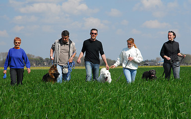Image showing people and dogs