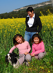 Image showing family and dog