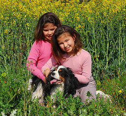 Image showing twins and dog