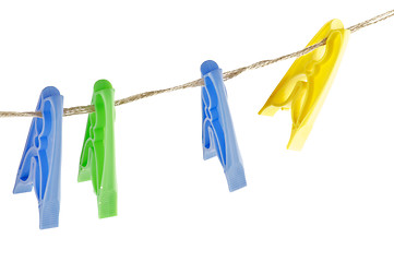 Image showing Four colour Clothespins