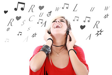 Image showing Rock style woman with headphones listening to music 