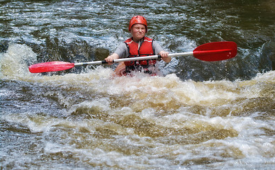 Image showing teenager white water kayaking