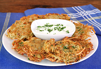 Image showing German Potato Pancakes and Sour Cream