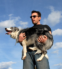 Image showing man and border collie