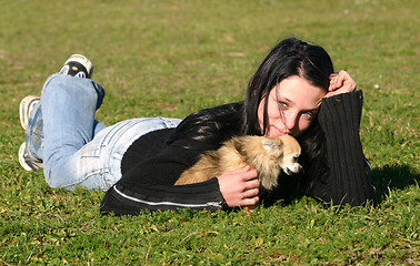 Image showing girl and chihuahua