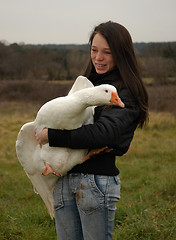 Image showing teenager and goose