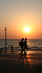 Image showing Sunset couple on the beach