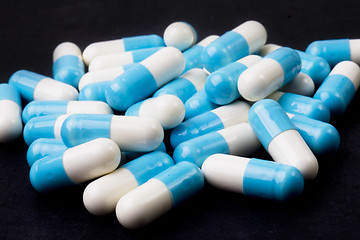 Image showing blue and white capsules