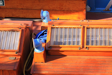 Image showing details of an old fishing boat sailing out of wood