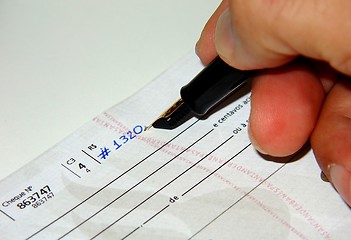 Image showing Filling a check