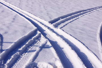 Image showing tire tracks in the snow in winter