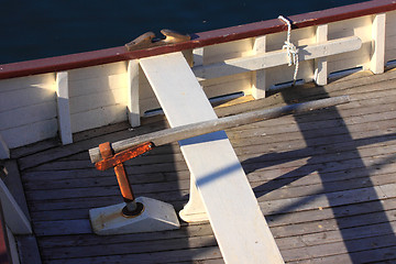 Image showing details of an old fishing boat sailing out of wood