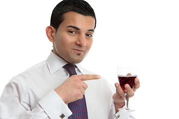 Image showing Man showing or presenting wine