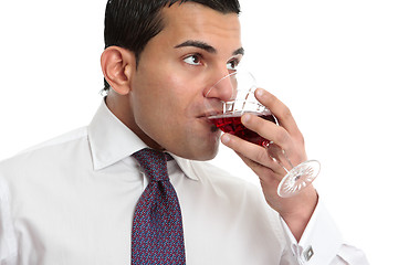 Image showing Man drinking or wine tasting