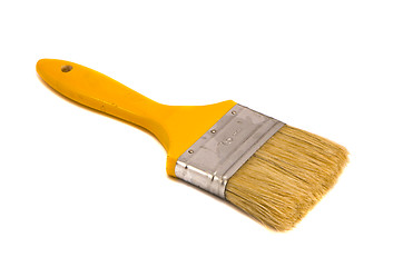 Image showing Brush 75mm wide yellow shaft paint isolated 