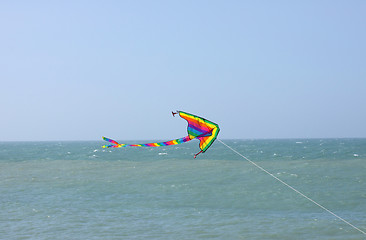 Image showing kite in a blue sky above the sea