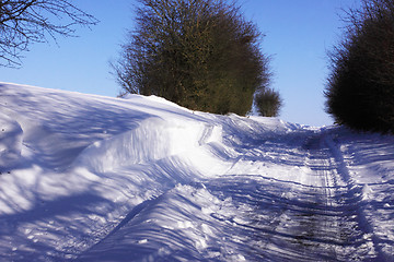 Image showing snowy road in the winter sun in France