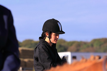 Image showing portrait of a young rider before a contest