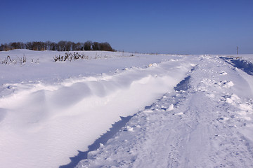 Image showing snowy road in the winter sun in France