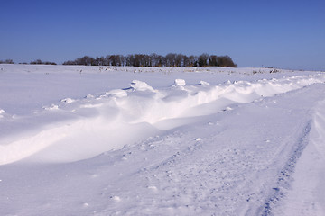 Image showing snowy road in the winter sun in France