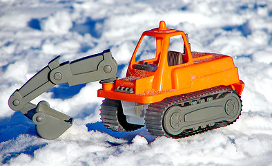 Image showing Toy excavator on the snow