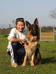 Image showing german shepherd and girl